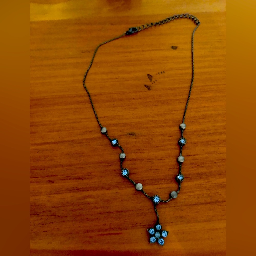 Delicate sparkly blue and silver necklace.